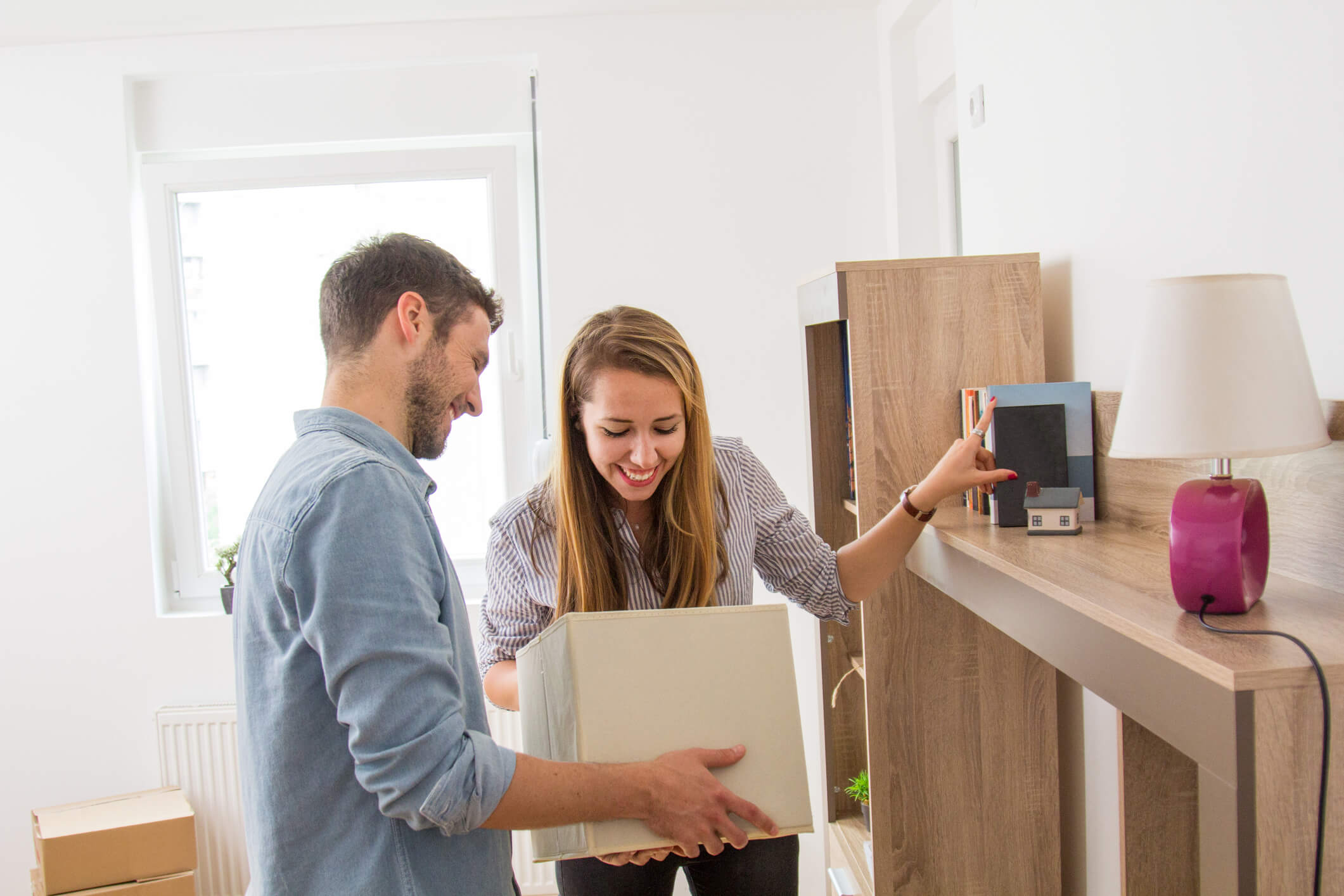 A couple organizing their apartment