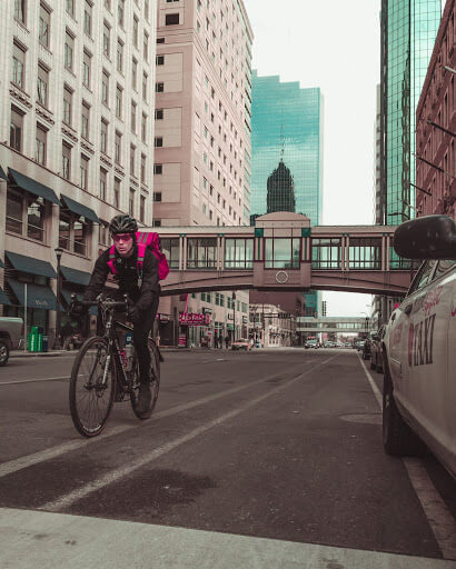 Man biking through downtown Minneapolis